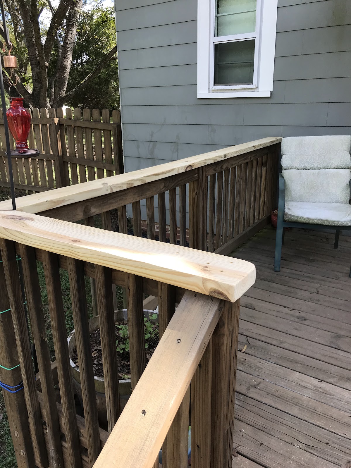 New wooden deck railing built by Mill Town Handyman